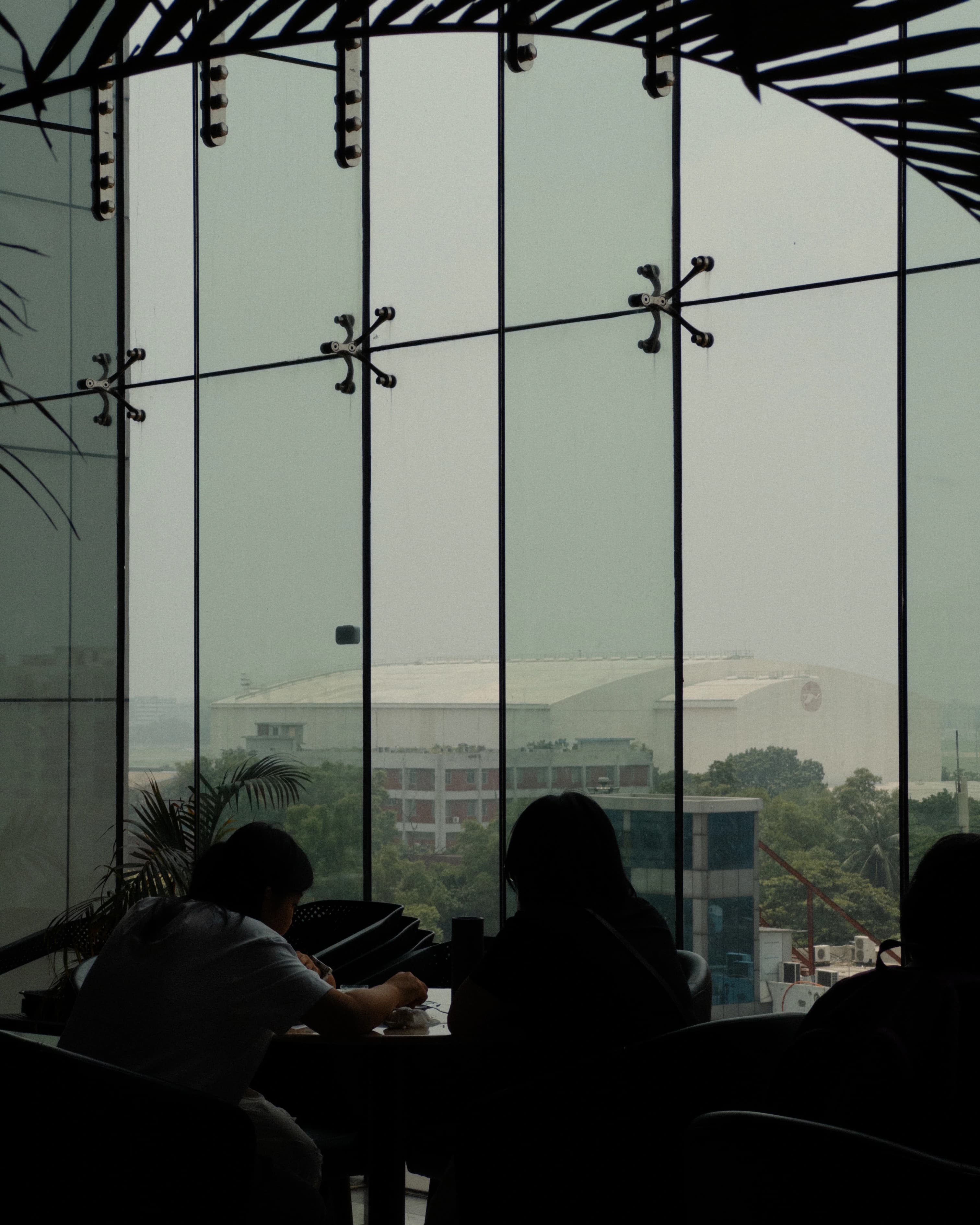 People having having coffe, lost in their world.